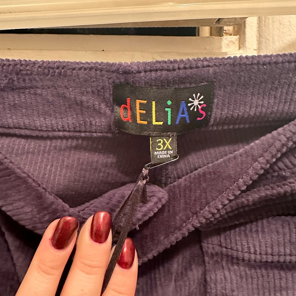 Delia’s Dolls Kill navy corduroy wide leg pants.